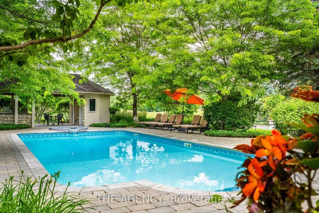 The pool, hot tub and cabana